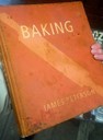 An orange book with the title &quot;Baking&quot; by James Peterson