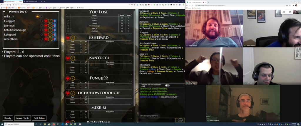 Screenshot of Dominion online game beside people's faces in Google Meet squares.